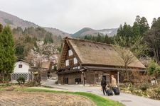 Shirakawa Go (Shirakawa-go) Romantic tourists couple stay overnight at a gassho-zukuri farmhouse Homestay, minshuku, family run, Japanese style lodgings, Shirakawago Village, Gifu, Japan