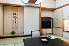 Traditional Japanese style room with tatami floor mats in Aburaya Ryokan.