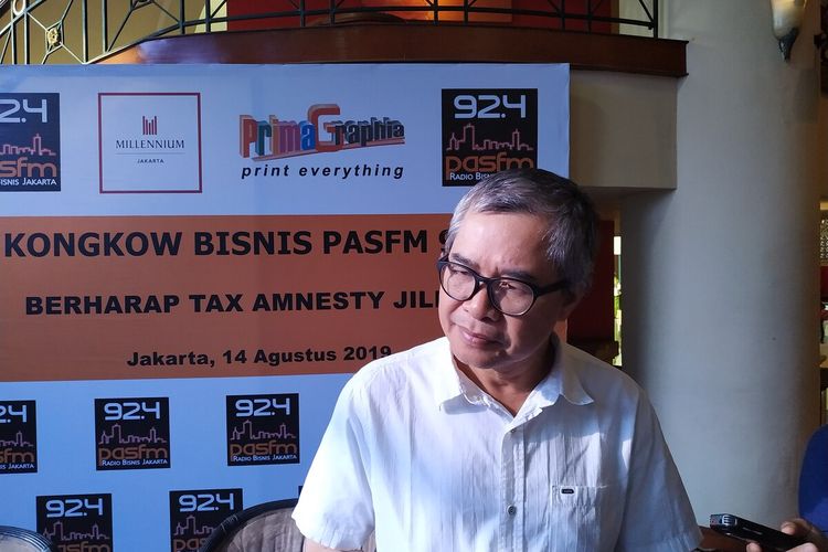Direktur Riset Centre of Economic Reform (CORE) Piter Abdullah menyampaikan pendapatnya terkait adanya wacana Tax Amnesty jilid II dalam sebuah diskusi di Jakarta, Rabu (14/8/2019).