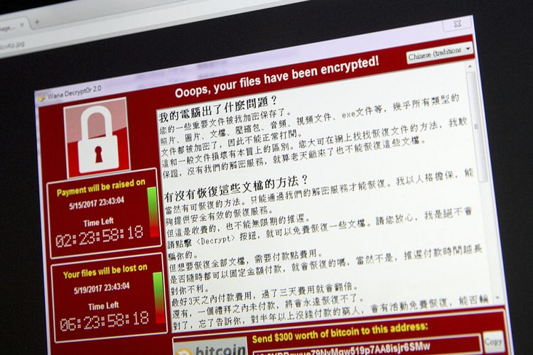 Tampilan layar komputer yang diserang virus ransomware WannaCry.
