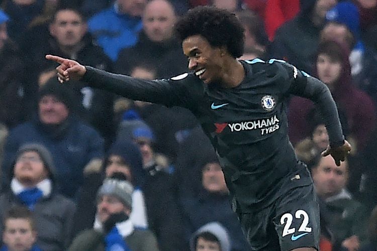 Gelandang Chelsea asal Brasil, Willian, melakukan selebrasi setelah mencetak gol kedua timnya ke gawang Brighton and Hove Albion dalam pertandingan Premier League di American Express Community Stadium, Brighton, Sabtu (20/1/2018).