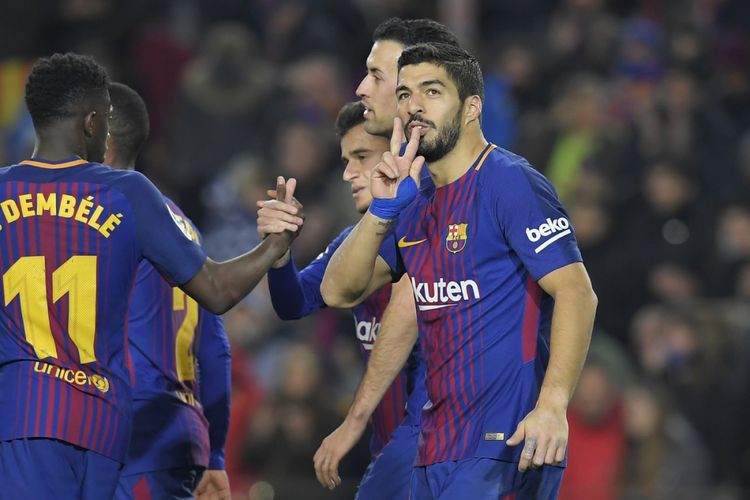 Luis Suarez merayakan gol Barcelona ke gawang Girona pada pertandingan Divisi Primera La Liga di Camp Nou, Sabtu (24/2/2018). 