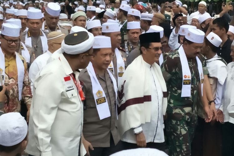 Kapolri Jenderal Pol Tito Karnavian menghadiri acara Haul Emas Guru Tua di Palu, Sabtu (30/6/2018)