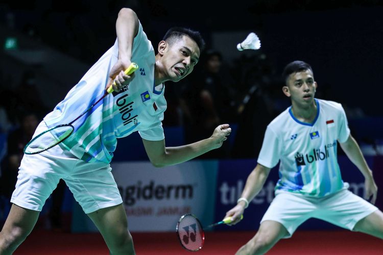 Pasangan ganda putra Indonesia, Fajar Alfian/Muhammad Rian Ardianto saat melawan ganda putra China, Huang Kai Xiang/Liu Cheng dalam babak kedua Blibli Indonesia Open 2019 di Istora Senayan, kompleks GBK, Jakarta, Rabu (17/7/2019). Ganda putra Indonesia, Fajar Alfian/Muhammad Rian menang dengan skor 18-21 21-14 21-16.