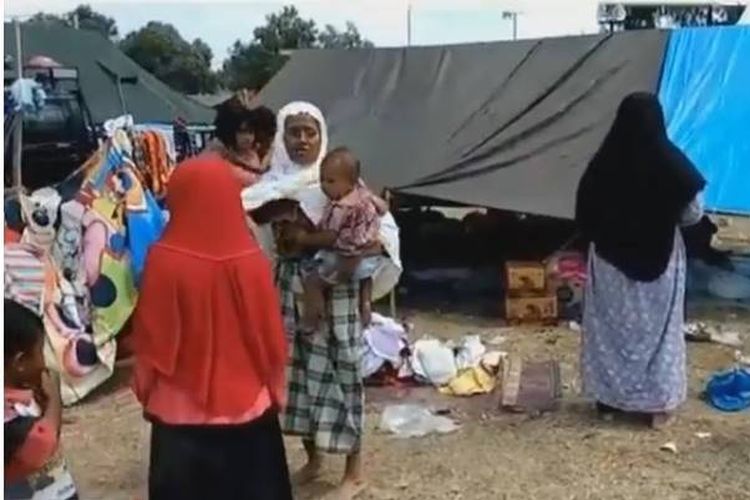 Gempa susulan yang kembali mengguncang Nusa Tenggara Barat, Kamis (9/8/2018) sekitar pukul 13.25 Wita, menimbulkan kepanikan warga di Lombok Utara, NTB.