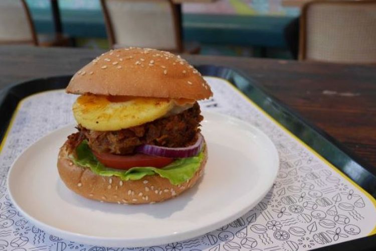  Sajian Hawaiian Burger yang dihidangkan di restoran vegan The Alley di Melbourne. (ABC Rural/Cath McAloon)
