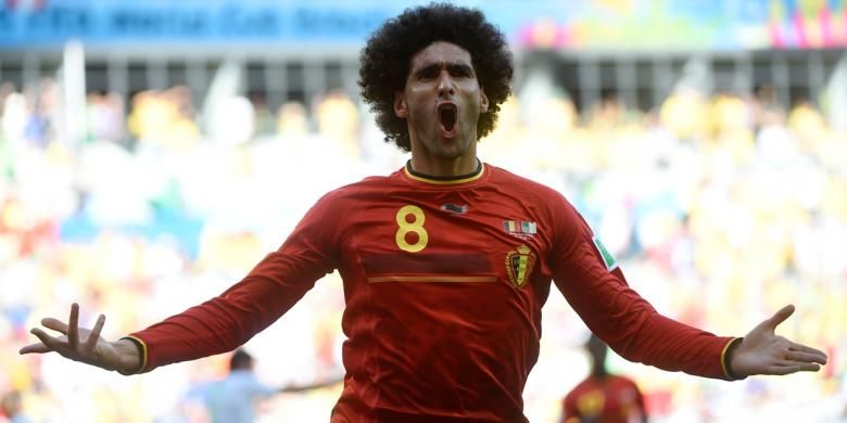 Selebrasi gelandang tim nasional Belgia, Maroune Fellaini, seusai mencetak gol ke gawang Aljazair, Selasa (17/6/2014). 
