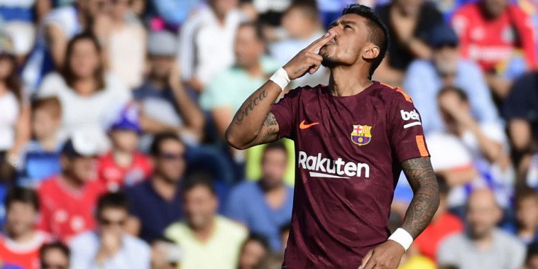 Selebrasi gelandang FC Barcelona, Paulinho, seusai mencetak gol ke gawang Getafe dalam laga La Liga Spanyol 2017-2018 di Stadion Coliseum Alfonso Perez, Madrid, Spanyol, pada Sabtu (16/9/2017).