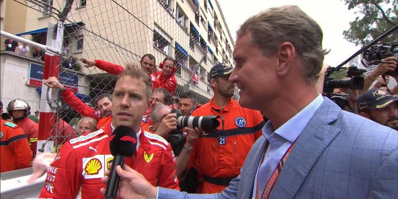 Sebastian Vettel sedang memberikan komentarnya atas hasil yang ia raih pada GP Monaco 2018, Minggu (27/5/2018).
