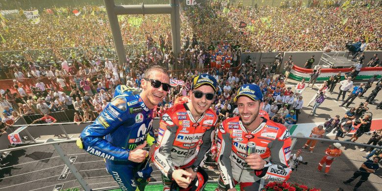 Valentino Rossi, Jorge Lorenzo, dan Andrea Dovizioso yang meraih podium di MotoGP Italia, Minggu (3/6/2018).
