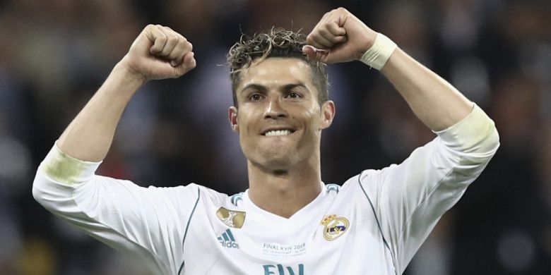 Megabintang Real Madrid, Cristiano Ronaldo, merayakan kemenangan timnya atas Liverpool FC dalam laga final Liga Champions di Stadion NSC Olimpiyskiy, Kiev, Ukraina pada 26 Mei 2018.
