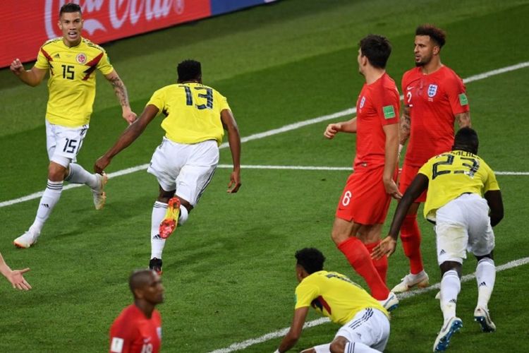 Para pemain Kolombia merayakan gol Yerry Mina ke gawang Inggris pada pertandingan babak 16 besar Piala Dunia 2018 di Stadion Spartak, 3 Juli 2018.