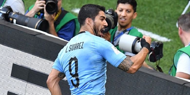 Penyerang Uruguay, Luis Suarez, merayakan golnya ke gawang Arab Saudi pada pertandingan Grup B Piala Dunia 2018 di Rostov Arena, 20 Juni 2018. 