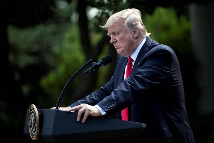 Presiden AS Donald Trump saat mengumumkan penarikan diri dari kesepakatan Paris di Rose Garden, Gedung Putih, Kamis (1/6/2017).
