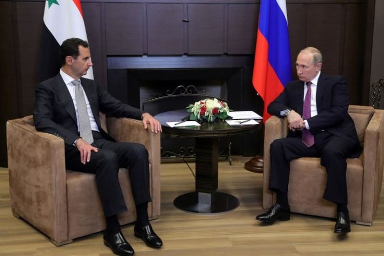 Presiden Suriah Bashar al-Assad bertemu dengan Presiden Rusia Vladimir Putin di kota Sochi, Senin (20/11/2017).