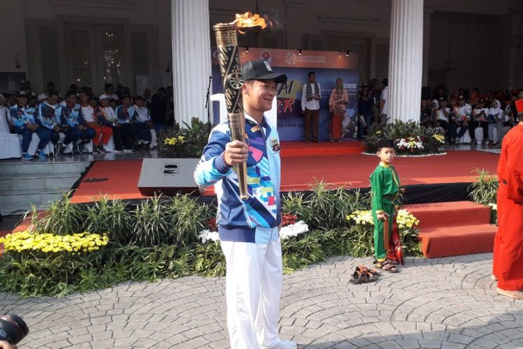 Ketua INAPGOC Raja Sapta Oktohari dalam acara kirab obor Asian Para Games 2018 di Balaikota DKI Jakarta, Minggu (30/9/2018).