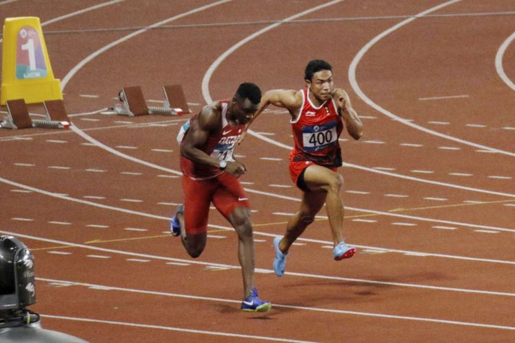 Pelari Indonesia Lalu Muhammad Zohri (no.400) beradu kecepatan dengan pelari lainnya saat babak final Lari 100 meter Putra Asian Games ke-18 Tahun 2018 di Stadion Utama Gelora Bung Karno Senayan, Jakarta Pusat, Minggu (26/8/2018). Lalu Muhammad Zohri gagal persembahkan medali.