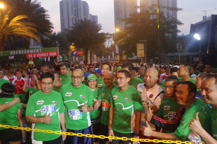 Wakil gubernur terpilih DKI Jakarta Sandiaga Uno mengikuti kompetisi lari Milo Jakarta Internasional 10K, Minggu (23/7/2017). 