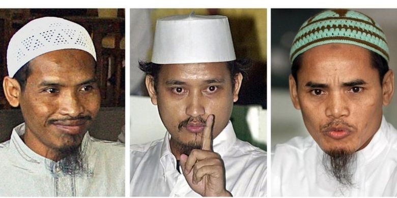 Dari kiri ke kanan: Ali Ghufron alias Mukhlas, Imam Samudra alias Abdul Aziz, dan Amrozi saat dihadirkan dalam persidangan tahun 2003 terkait keterlibatan mereka dalam pengeboman di Bali pada 2002 yang menewaskan 202 orang. Ketiganya merupakan anggota Jamaah Islamiyah (JI).