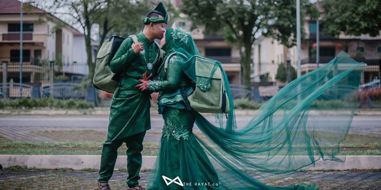 Pasangan Malaysia, Nur Atiqah dan Mohamad Afandi melakukan foto pernikahan bertema GrabFood.(Nur Atiqah)
