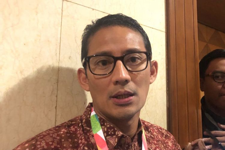 Wakil Gubernur DKI Jakarta Sandiaga Uno ketika ditanya kemungkinan jadi cawapres di Balai Kota, Kamis (9/8/2018). 