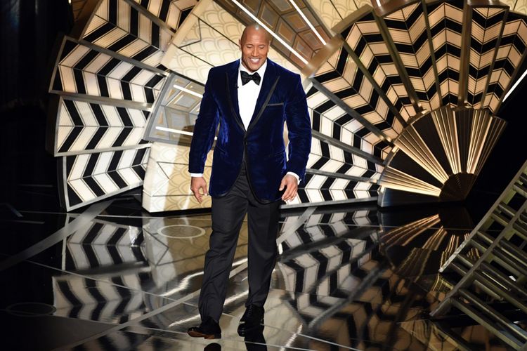 Aktor Dwayne Johnson alias The Rock pada 89th Annual Academy Awards di Hollywood & Highland Center 26 Februari 2017.   Kevin Winter/Getty Images/AFP