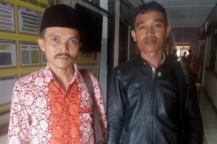 Ketua MUI Kecamatan Caringin dan Kepala Desa Purbayani saat ditemui di Mapolres Garut, Selasa (4/12/2018)