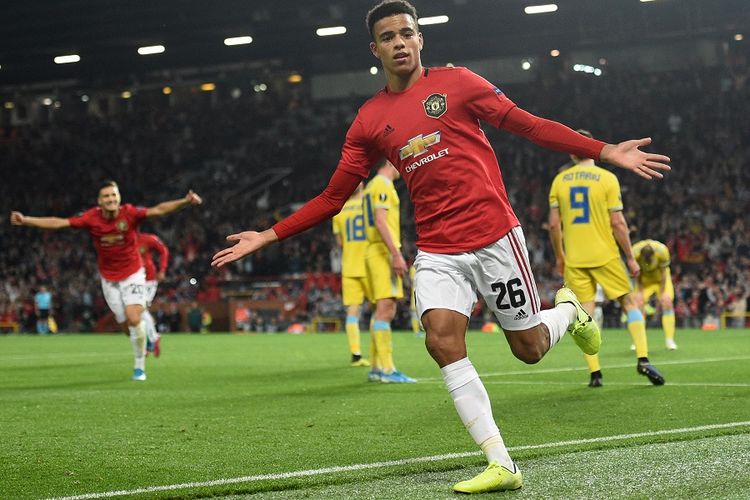 Striker Manchester United, Mason Greenwood, berselebrasi setelah mencetak gol pembuka pertandingan Grup L Liga Europa antara Man United vs Astana di Old Trafford di Manchester, Inggris, pada 19 September 2019.