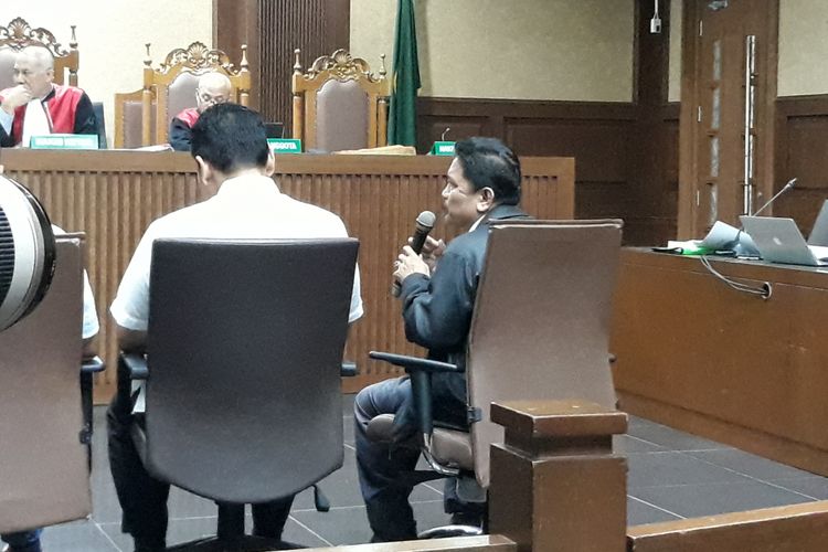 Panitera pengganti Pengadilan Negeri Medan, Oloan Sianturi bersaksi di Pengadilan Tipikor Jakarta, Kamis (21/2/2019).