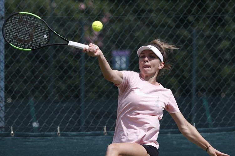 Gaya Simona Halep ketika berlatih jelang final Wimbledon 2019, 12 Juli 2019. 