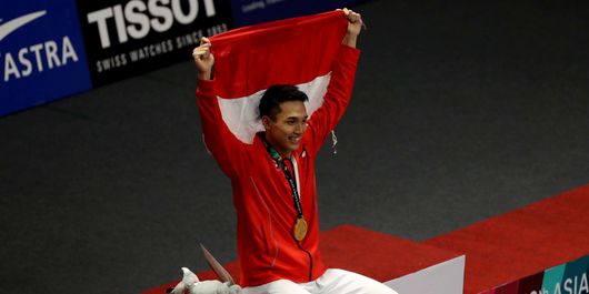 Tunggal putra Indonesia, Jonatan Christie, menyabet medali emas nomor perseorangan cabang olahraga bulu tangkis Asian Games 2018 dalam partai final di Istora Senayan, Jakarta, Selasa (28/8/2018). Jonatan menaklukkan wakil Taiwan, Chou Tien Chen. (KOMPAS.com/KRISTIANTO PURNOMO)