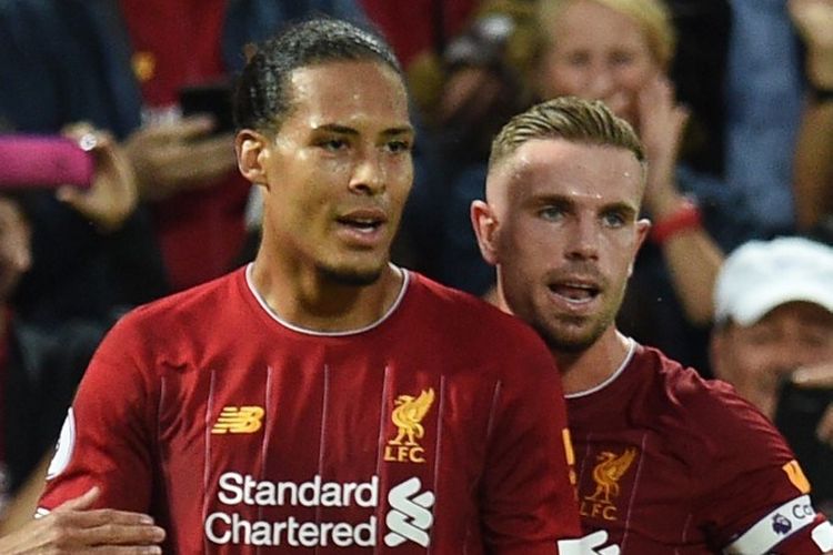 Jordan Henderson merayakan gol Virgil van Dijk pada pertandingan Liverpool vs Norwich City di Stadion Anfield dalam pekan pertama Liga Inggris 2019-2020, 9 Agustus 2019. 