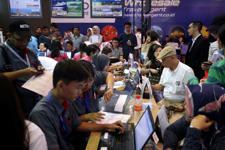 Suasana Garuda Indonesia Travel Fair 2017 di Jakarta Convention Center, Jumat (22/9/2017). Acara yang berlangsung hingga 24 September mendatang memberikan berbagai promo tiket, hotel, dan wisata. 