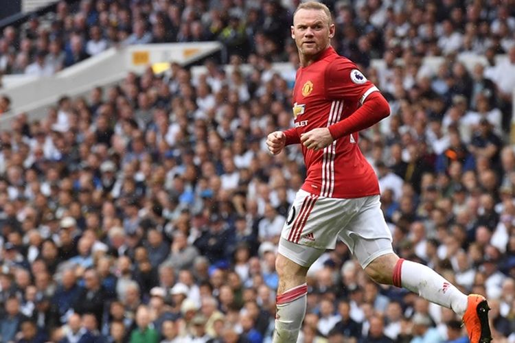Ekspresi penyerang Manchester United, Wayne Rooney, seusai mencetak gol dalam pertandingan melawan Tottenham Hotspurdi White Hart Lane in London, pada 14 Mei 2018.