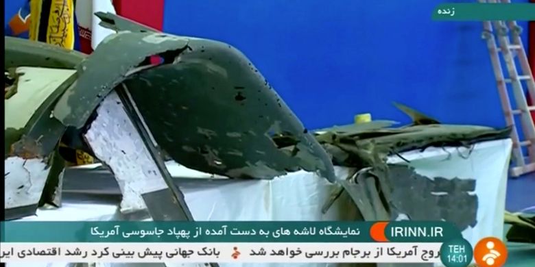 Inilah penampakan serpihan drone RQ-4A Global Hawk milik Amerika Serikat yang diklaim ditembak jatuh oleh Iran dalam tayangan bertanggal 21 juni 2019 di sebuah lokasi yang dirahasiakan.
