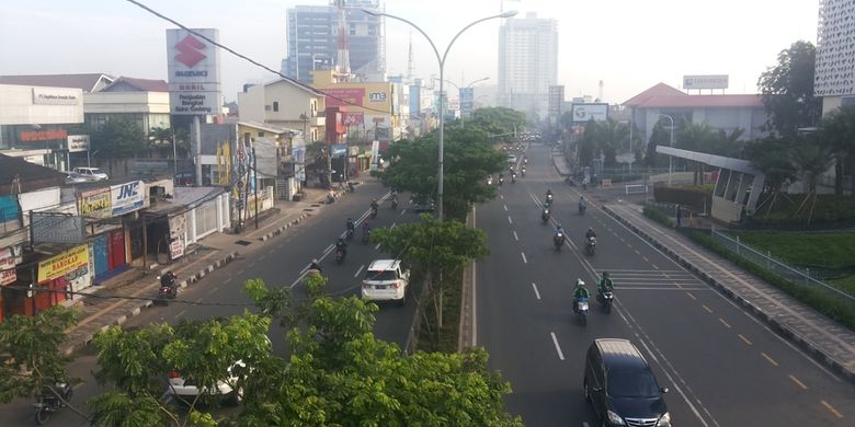 Kondisi Jalan Margonda, Depok saat penerapan sistem contra flow pada Senin (13/2/2017) pagi. Tampak ruas jalan terpantau lancar.