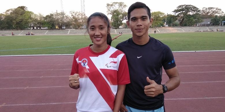 Pasangan atlet Asian Para Games 2018 perwakilan Indonesia, Nur Ferry Pradana dan Putri Aulia, saat diwawancarai di Stadion Sriwedari, Solo, Kamis (27/9/2018).