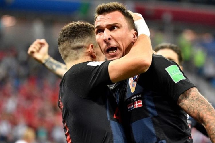 Mario Mandzukic merayakan gol Kroasia ke gawang Denmark pada pertandingan babak 16 besar Piala Dunia 2018 di Nizhny Novgorod, 1 Juli 2018. 