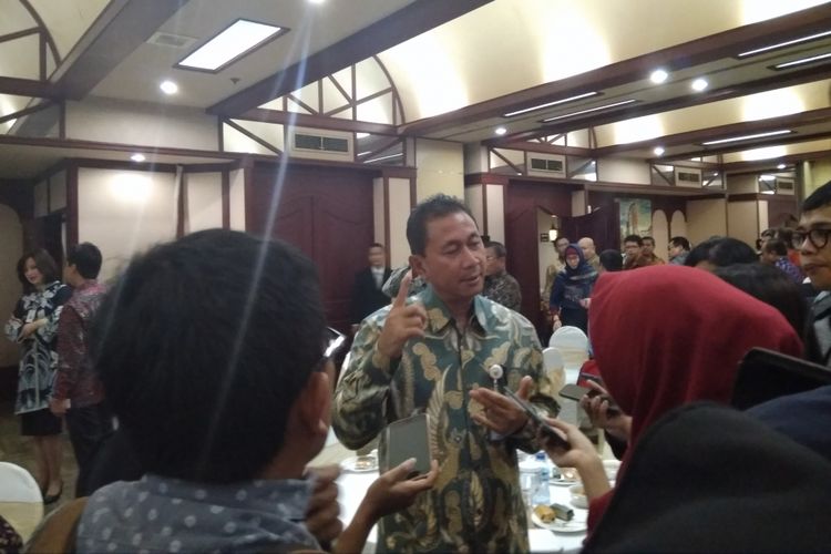 Deputi Kementerian BUMN Bidang Jasa Usaha Keuangan Gatot Trihargo saat ditemui awak media selepas acara Penandatanganan Perjanjian Kerjasama Asuransi dan Penjaminan Perkreditan Bank Mandiri di Kementtttterian BUMN, Senin (16/4/2018). 