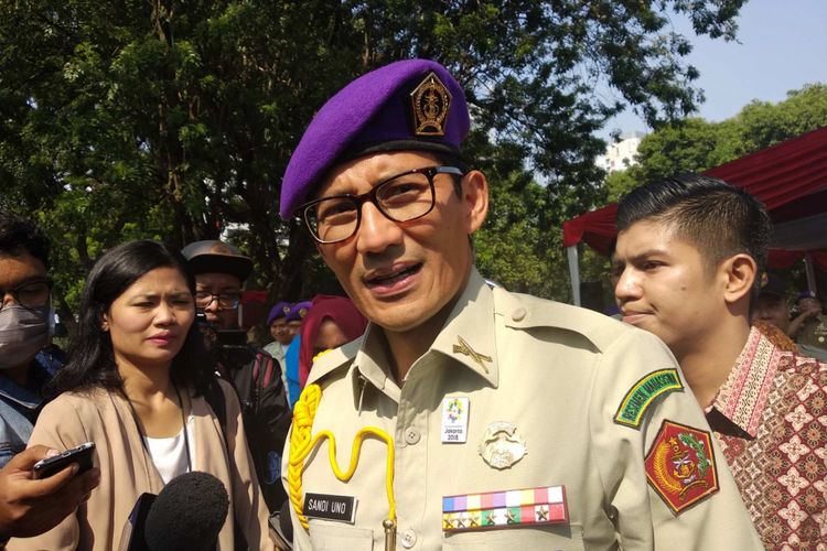 Wakil Gubernur DKI Jakarta Sandiaga Uno di hari ulang tahun ke-56 Resimen Mahasiswa Jakayakarta di Lapangan IRTI Monas, Sabtu (12/5/2018).
