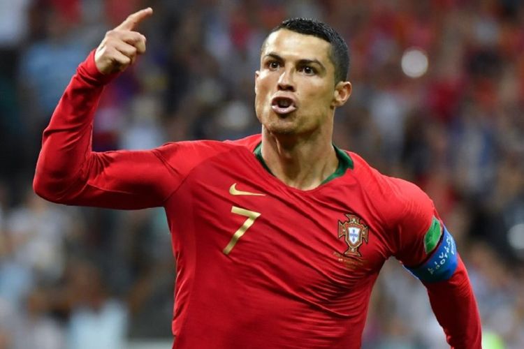 Cristiano Ronaldo merayakan gol Portugal ke gawang Spanyol pada pertandingan Grup B Piala Dunia 2018, 15 Juni 2018. 