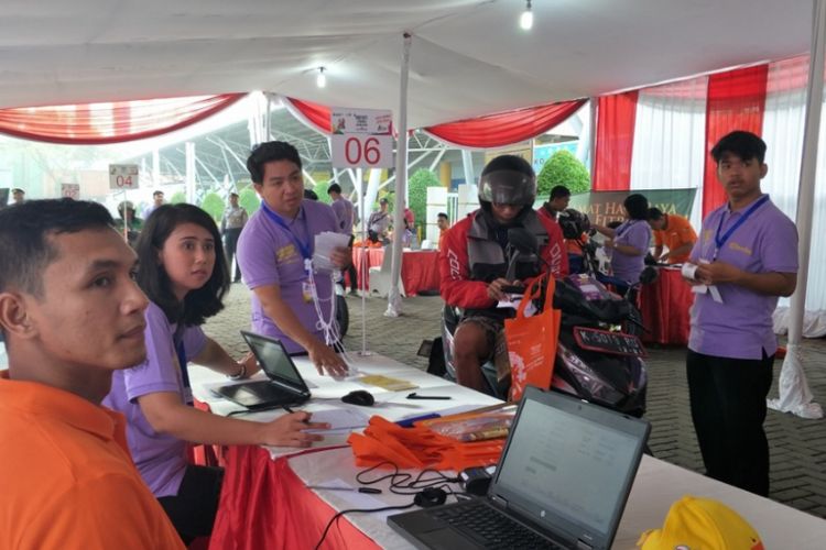 Suasana di posko registrasi program mudik gratis Kemenhub RI di Pelabuhan Tanjung Priok, Jakarta Utara, Minggu (10/6/2018).