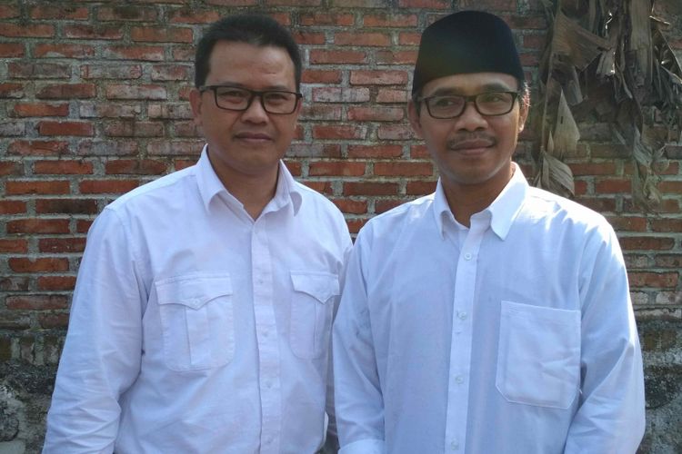 M Al Khadziq (kanan) dan pasangan cabup Heri Ibnu Wibowo ditetapkan sebagai calon bupati dan wakil bupati Temanggung, Kamis (26/7/2018).