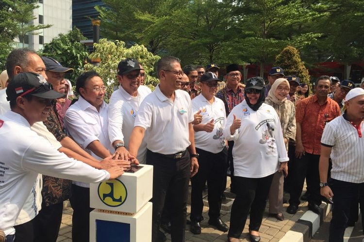 Menteri PUPR Basuki Hadimuljono saat melepas rombongan mudik bareng di halaman Gedung Utama Kementerian PUPR, Jumat (31/5/2019).