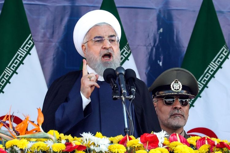 Presiden Iran Hassan Rouhani saat berpidato dalam gelaran parade militer di Teheran, Sabtu (22/9/2018).