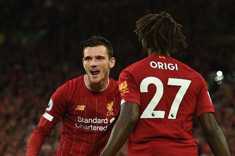 Andrew Robertson merayakan gol Divock Origi pada pertandingan Liverpool vs Norwich City di Stadion Anfield dalam pekan pertama Liga Inggris 2019-2020, 9 Agustus 2019. 