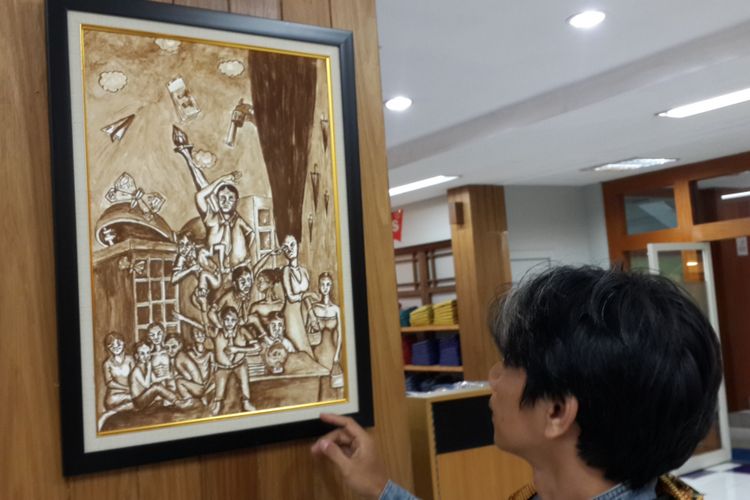 Lukisan dari kopi karya Wirastho atau Sawir saat dipamerkan di Kota Malang, Jumat (9/3/2018)