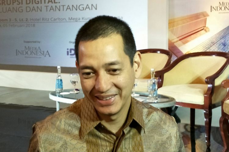 Direktur Teknologi Informasi, PT Bank Tabungan Pensiunan Nasional Tbk (BTPN) Karim Siregar saat menjadi pembicara pada acara Disruptif Ekonomi Digital di Ritz Carlton, Jakarta, Senin (5/1/2018).