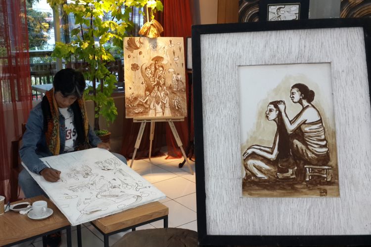 Wirastho atau Sawir, seniman lukis dari kopi dalam pameran tunggalnya di Kota Malang, Jumat (9/3/2018)
