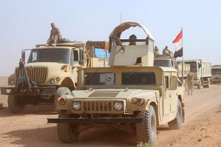 Pasukan Irak tengah bergerak maju menuju Kota Rawa (28/10/2017). Rawa diklaim sebagai basis terakhir ISIS. Perang dengan ISIS menghabiskan anggaran hingga Rp 1.350 triliun